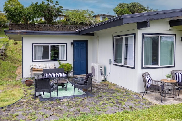 45-563 Kukane St, Kaneohe, HI 96744 - view of patio / terrace with a cooling unit and outdoor lounge area