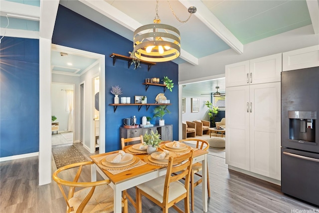 45-563 Kukane St, Kaneohe, HI 96744 - dining room with a chandelier, wood finished floors, beam ceiling, and baseboards