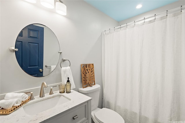 45-563 Kukane St, Kaneohe, HI 96744 - bathroom featuring vanity, toilet, and curtained shower