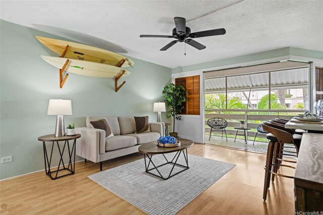 1330 Wilder Ave Unit 310, Honolulu, HI 96822 - living room featuring wood finished floors and ceiling fan