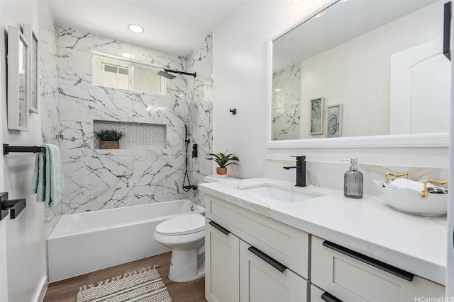 84-1001 Lahaina St Unit 1, Waianae, HI 96792 - bathroom featuring toilet, wood finished floors, vanity, and shower / bathing tub combination