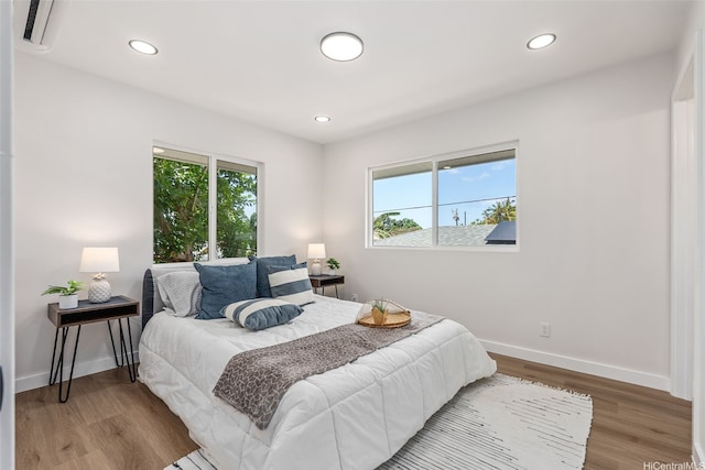 84-1001 Lahaina St Unit 1, Waianae, HI 96792 - bedroom featuring wood finished floors and recessed lighting