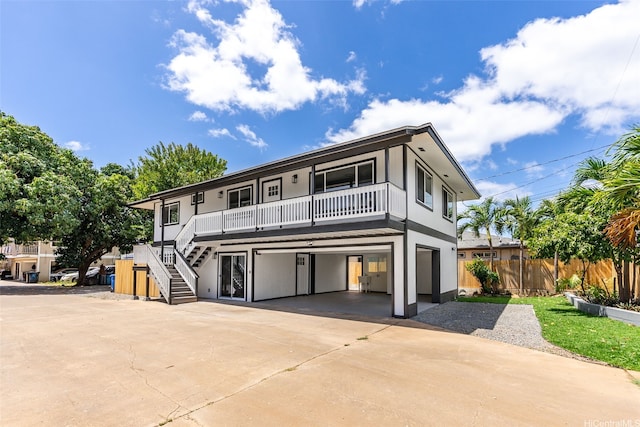 84-1001 Lahaina St Unit 1, Waianae, HI 96792 - beach home featuring a porch, fence, stairs, an attached garage, and driveway