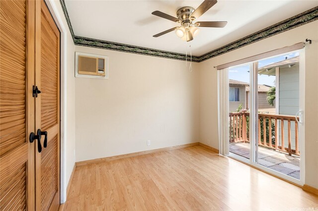 91-1026B Hoomaka St Unit 35, Ewa Beach, HI 96706 - unfurnished room with light wood-type flooring, a ceiling fan, baseboards, and a wall mounted air conditioner