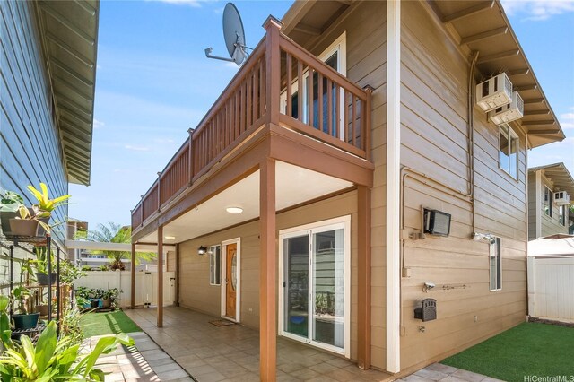91-1026B Hoomaka St Unit 35, Ewa Beach, HI 96706 - view of home's exterior with a balcony and a patio