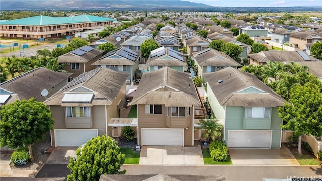 birds eye view of property with a residential view