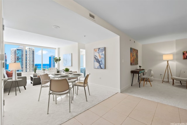 1009 Kapiolani Blvd Unit 3708, Honolulu, HI 96814 - carpeted dining space with tile patterned flooring