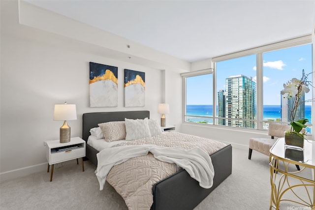 1009 Kapiolani Blvd Unit 3708, Honolulu, HI 96814 - bedroom featuring carpet and a water view