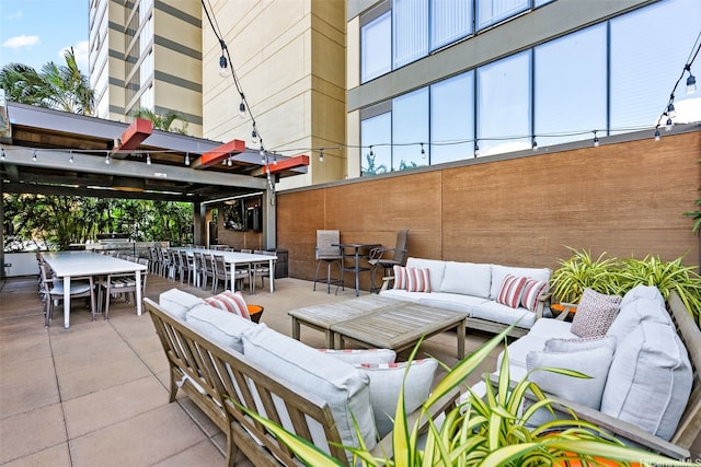 1009 Kapiolani Blvd Unit 3708, Honolulu, HI 96814 - view of patio with an outdoor living space and outdoor dining space