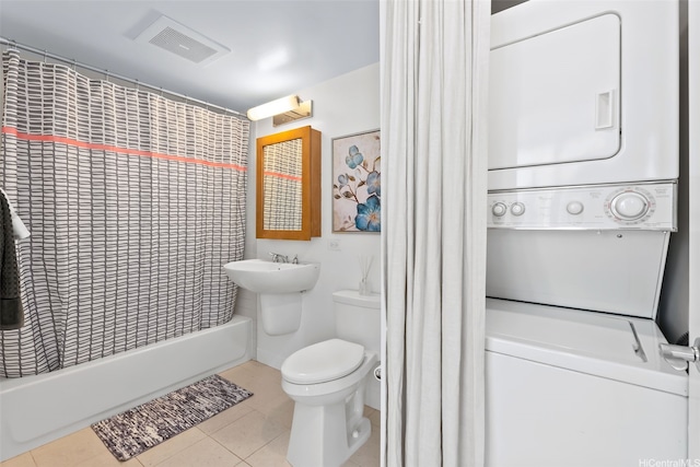 1009 Kapiolani Blvd Unit 3708, Honolulu, HI 96814 - full bath with stacked washer and clothes dryer, tile patterned flooring, and shower / tub combo