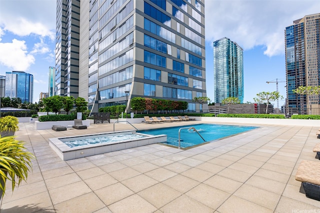 1009 Kapiolani Blvd Unit 3708, Honolulu, HI 96814 - community pool featuring a city view and a patio area