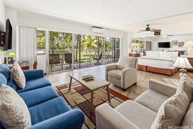 living room with a ceiling fan, light tile patterned floors, and a wall mounted air conditioner