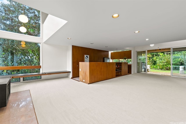 156 Forest Ridge Way, Honolulu, HI 96822 - kitchen featuring light carpet, recessed lighting, and wood walls