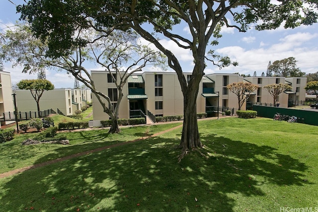 95-017 Kuahelani Ave Unit 124, Mililani, HI 96789 - view of home's community with a lawn