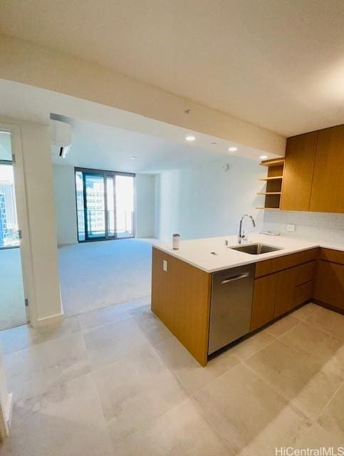 kitchen with brown cabinetry, open shelves, a sink, light countertops, and open floor plan