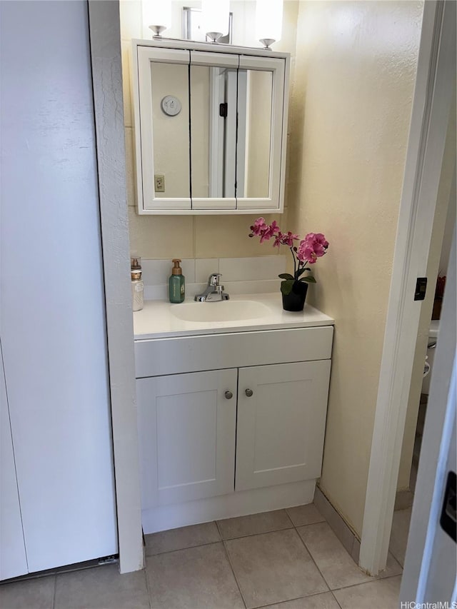 2847 Waialae Ave Unit 209, Honolulu, HI 96826 - bathroom featuring vanity and tile patterned flooring