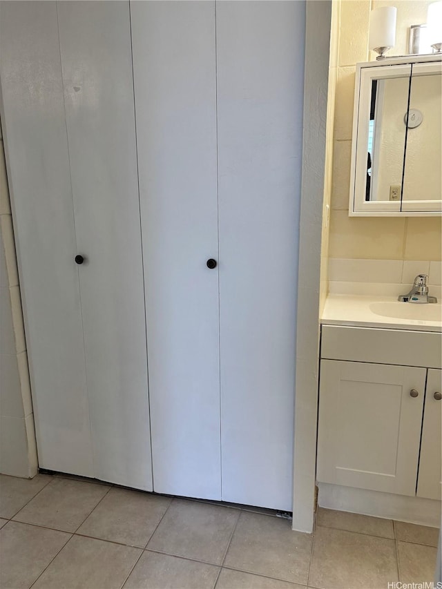 2847 Waialae Ave Unit 209, Honolulu, HI 96826 - bathroom featuring tile patterned floors and vanity