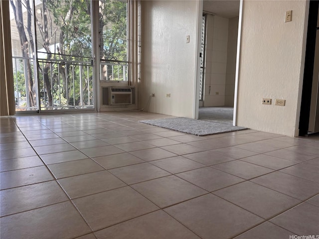 2847 Waialae Ave Unit 209, Honolulu, HI 96826 - unfurnished room with a textured wall, tile patterned flooring, and cooling unit