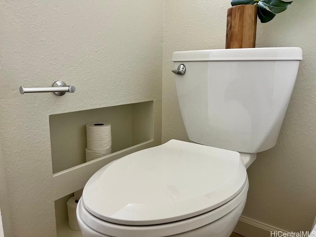 91-495 Puamaeole St Unit 38R, Ewa Beach, HI 96706 - bathroom with toilet and a textured wall