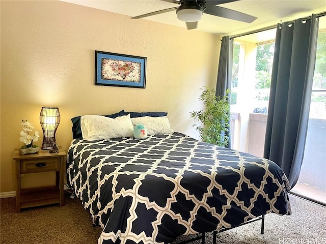 bedroom featuring carpet floors, access to exterior, and ceiling fan