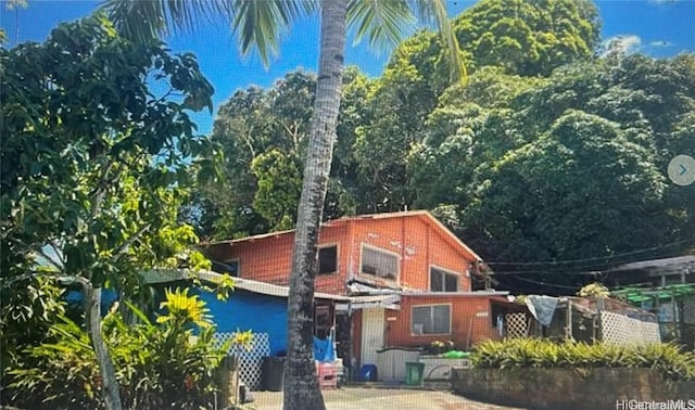 view of front of home with fence