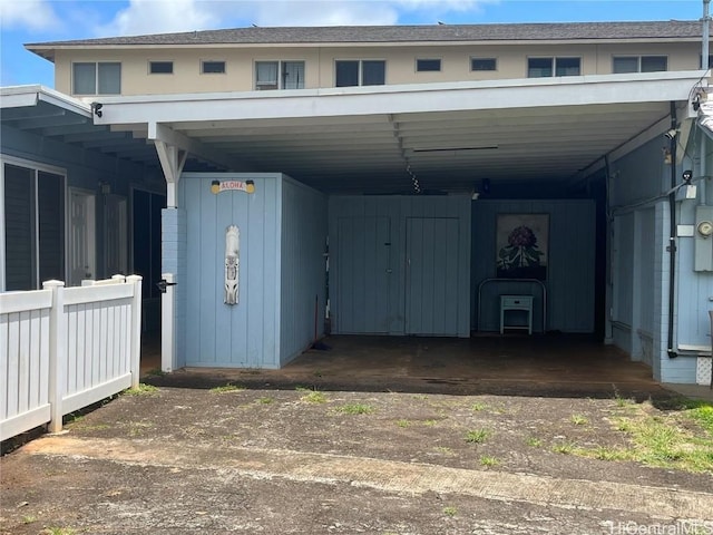 36 Ilima St, Wahiawa, HI 96786 - view of vehicle parking featuring a carport and fence