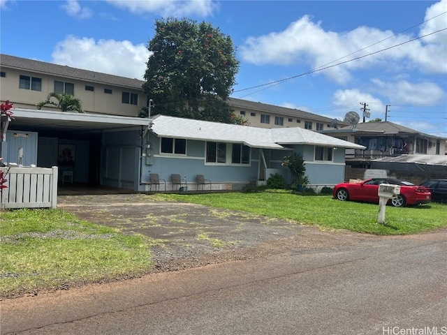 36 Ilima St, Wahiawa, HI 96786 - view of front facade featuring a front yard and aphalt driveway