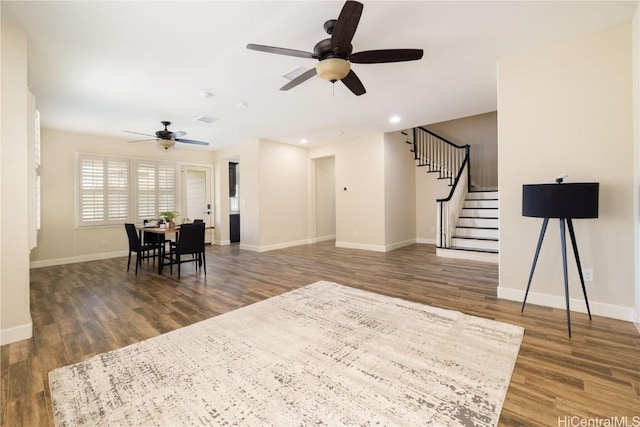 91-1072 Waikapoo St, Ewa Beach, HI 96706 - living room with baseboards, wood finished floors, and a ceiling fan