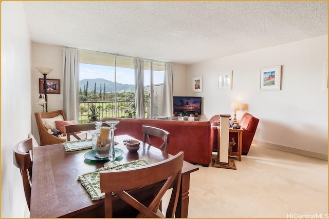 1830 Wilikina Dr Unit 612, Wahiawa, HI 96786 - dining room featuring baseboards, carpet floors, and a textured ceiling