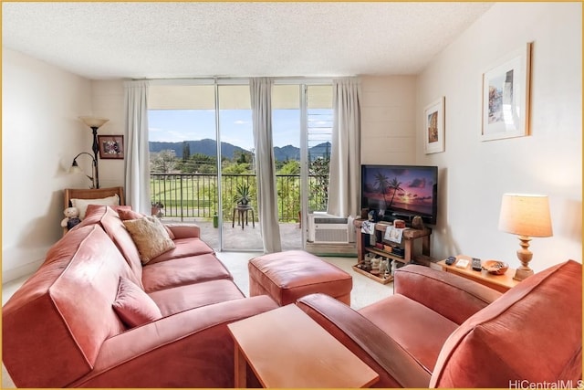 1830 Wilikina Dr Unit 612, Wahiawa, HI 96786 - carpeted living area with cooling unit, floor to ceiling windows, and a textured ceiling