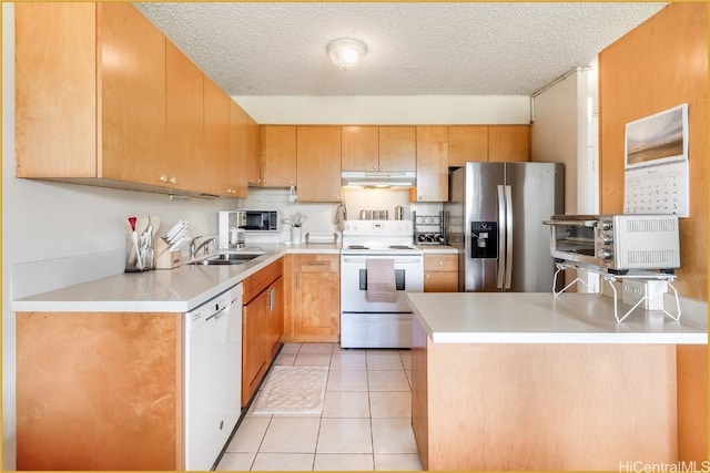 1830 Wilikina Dr Unit 612, Wahiawa, HI 96786 - kitchen with light countertops, white appliances, light tile patterned floors, under cabinet range hood, and a peninsula