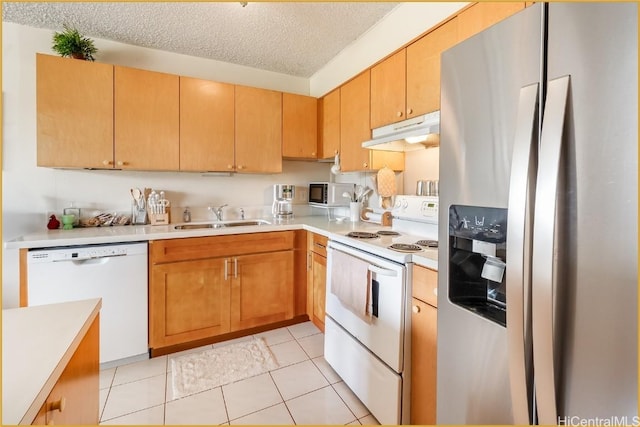 1830 Wilikina Dr Unit 612, Wahiawa, HI 96786 - kitchen with a textured ceiling, light countertops, white appliances, under cabinet range hood, and a sink