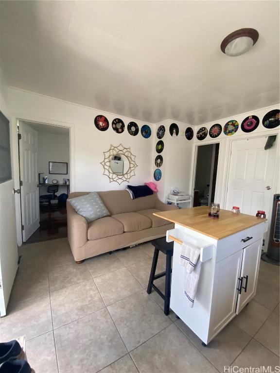 living room featuring light tile patterned floors