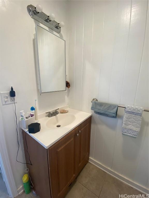 bathroom featuring tile patterned floors and vanity