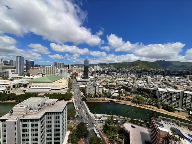 aerial view featuring a water view and a city view