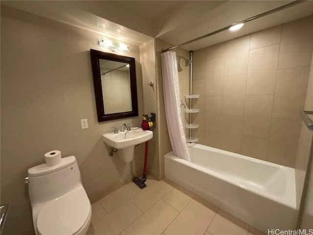 full bath with tile patterned floors, toilet, baseboards, and shower / bathtub combination with curtain