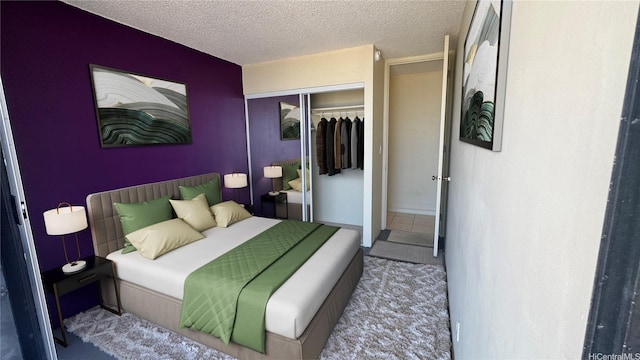 bedroom featuring a closet and a textured ceiling