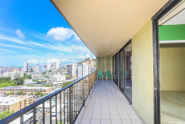 balcony featuring a city view