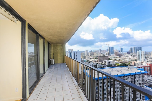 balcony featuring a skyline view