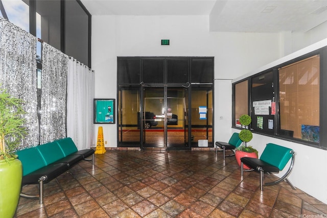 community lobby featuring a high ceiling