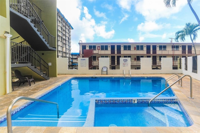 community pool with stairway