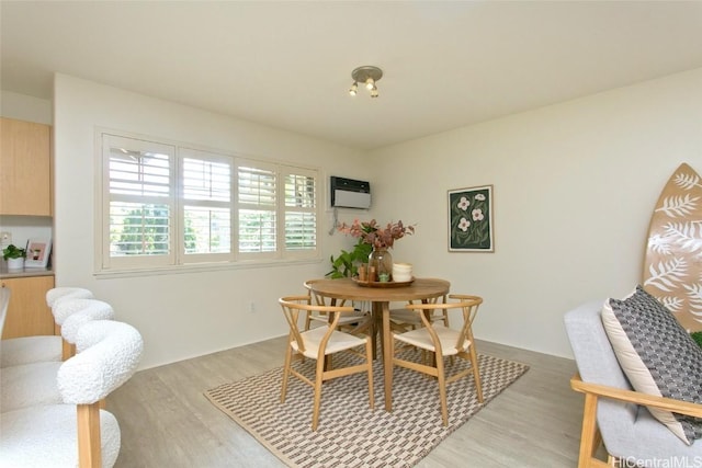 dining area with light wood-type flooring