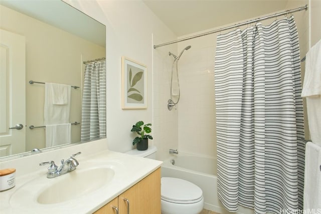 bathroom featuring toilet, shower / bathtub combination with curtain, and vanity