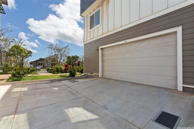 91-3575 Iwikuamoo St Unit 104, Ewa Beach, HI 96706 - garage featuring concrete driveway