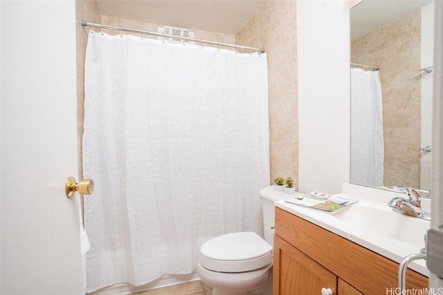 bathroom featuring tile walls, curtained shower, toilet, and vanity