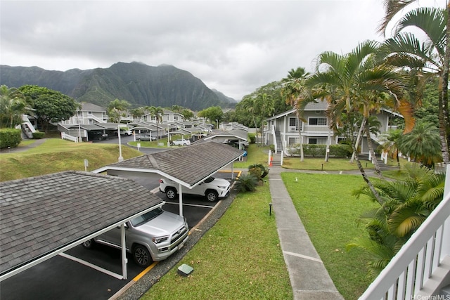 exterior space featuring a residential view and a mountain view