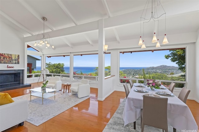 1735 Laukahi St, Honolulu, HI 96821 - sunroom featuring a chandelier, plenty of natural light, and a water view