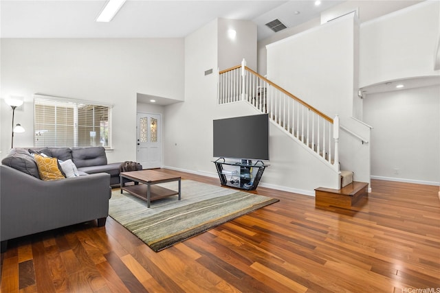 1000 Kaolo St, Honolulu, HI 96825 - living room featuring stairway, wood finished floors, and high vaulted ceiling