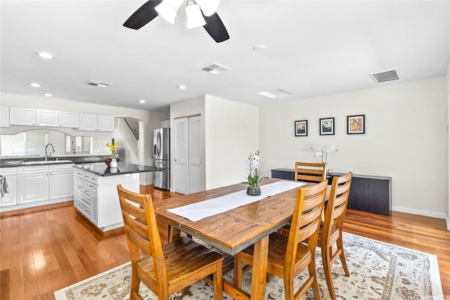 1000 Kaolo St, Honolulu, HI 96825 - dining room featuring light wood finished floors, visible vents, and a ceiling fan