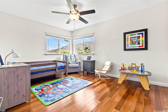 1000 Kaolo St, Honolulu, HI 96825 - bedroom with wood finished floors and ceiling fan